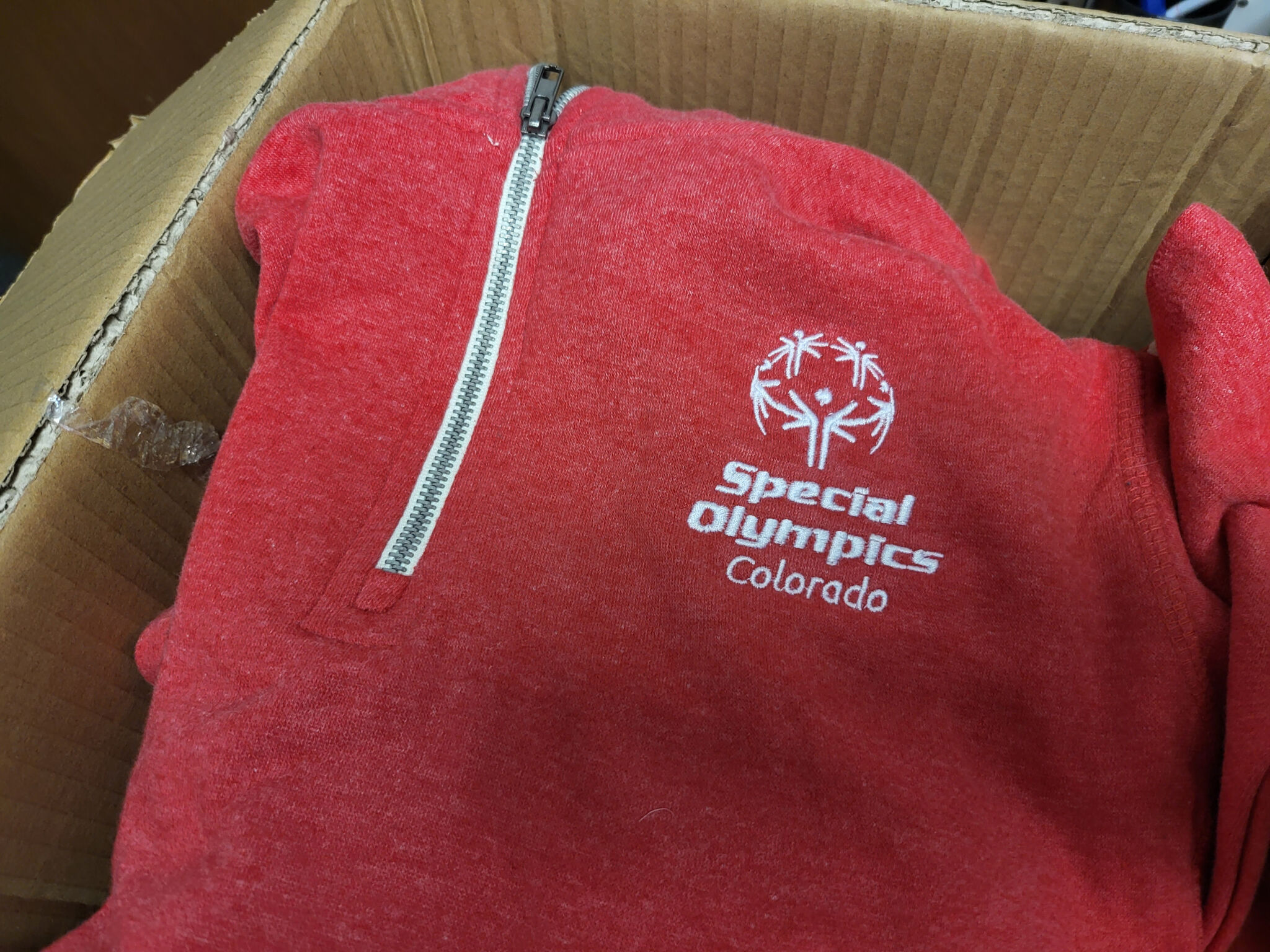 Personalized logo polos and hats Colorado